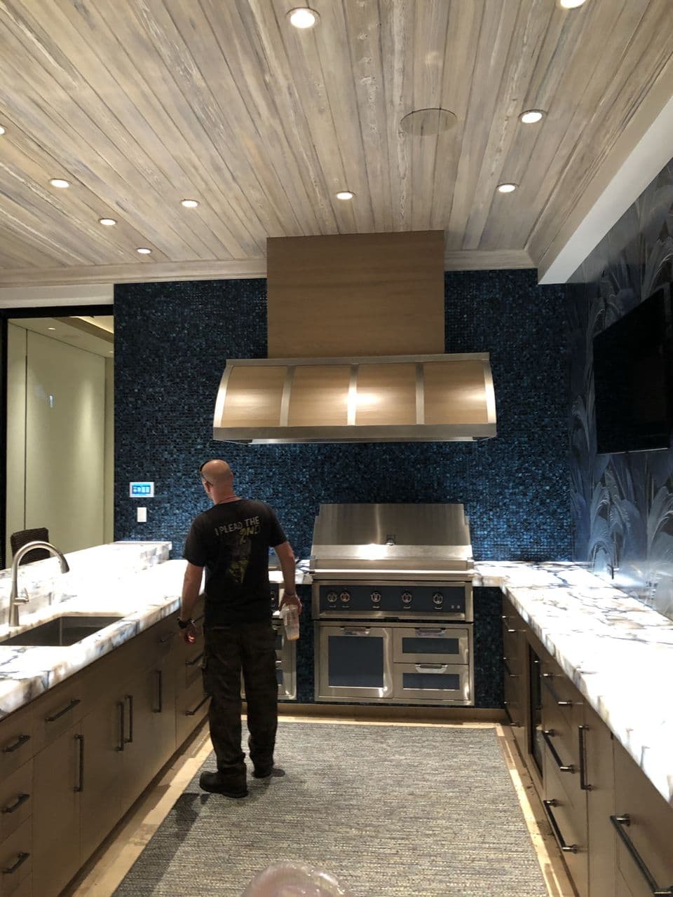Stainless kitchen range hood detail shot — Naples Welding Inc., Naples FL